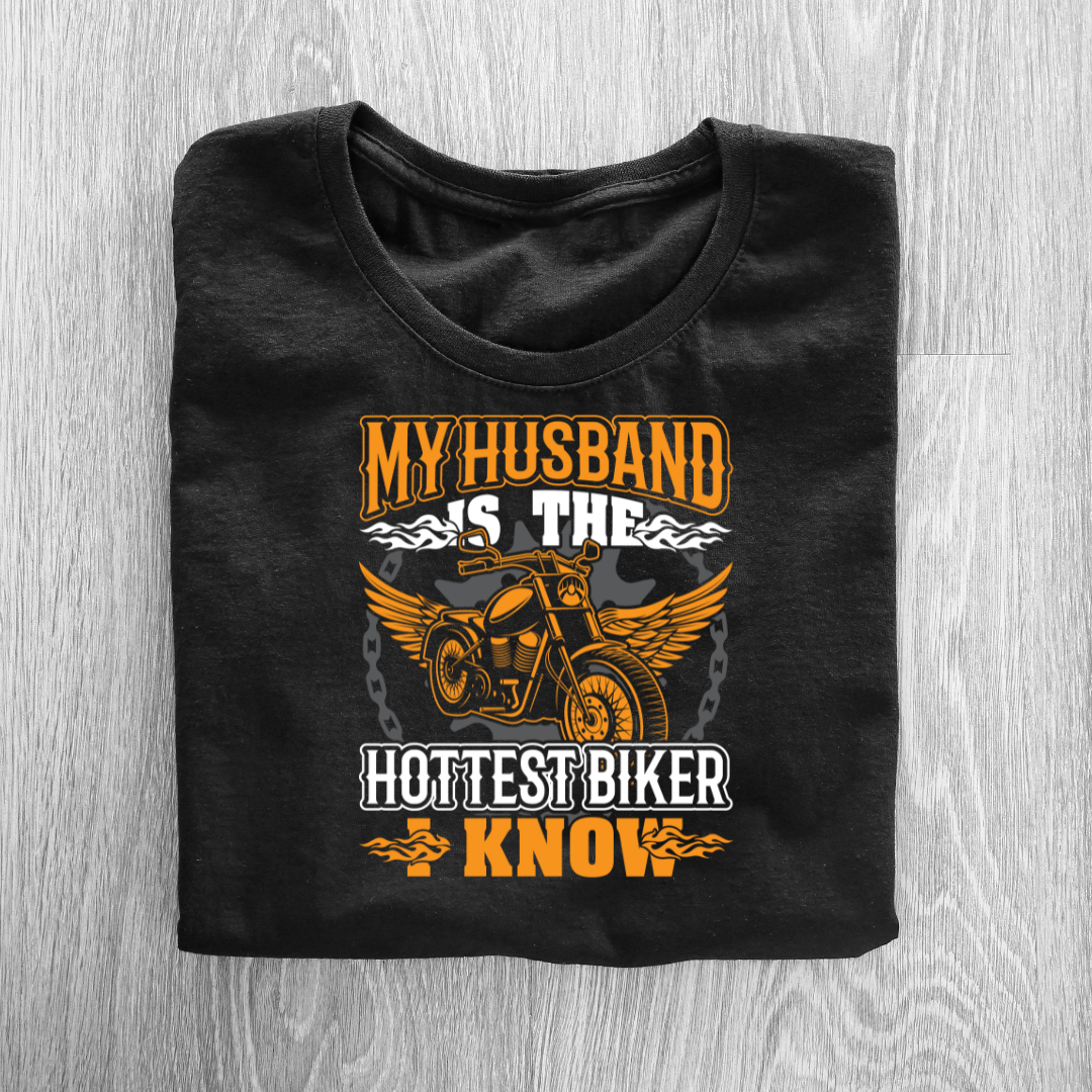 MY HUSBAND IS THE HOTTESTE BIKER UNISEX T-SHIRT